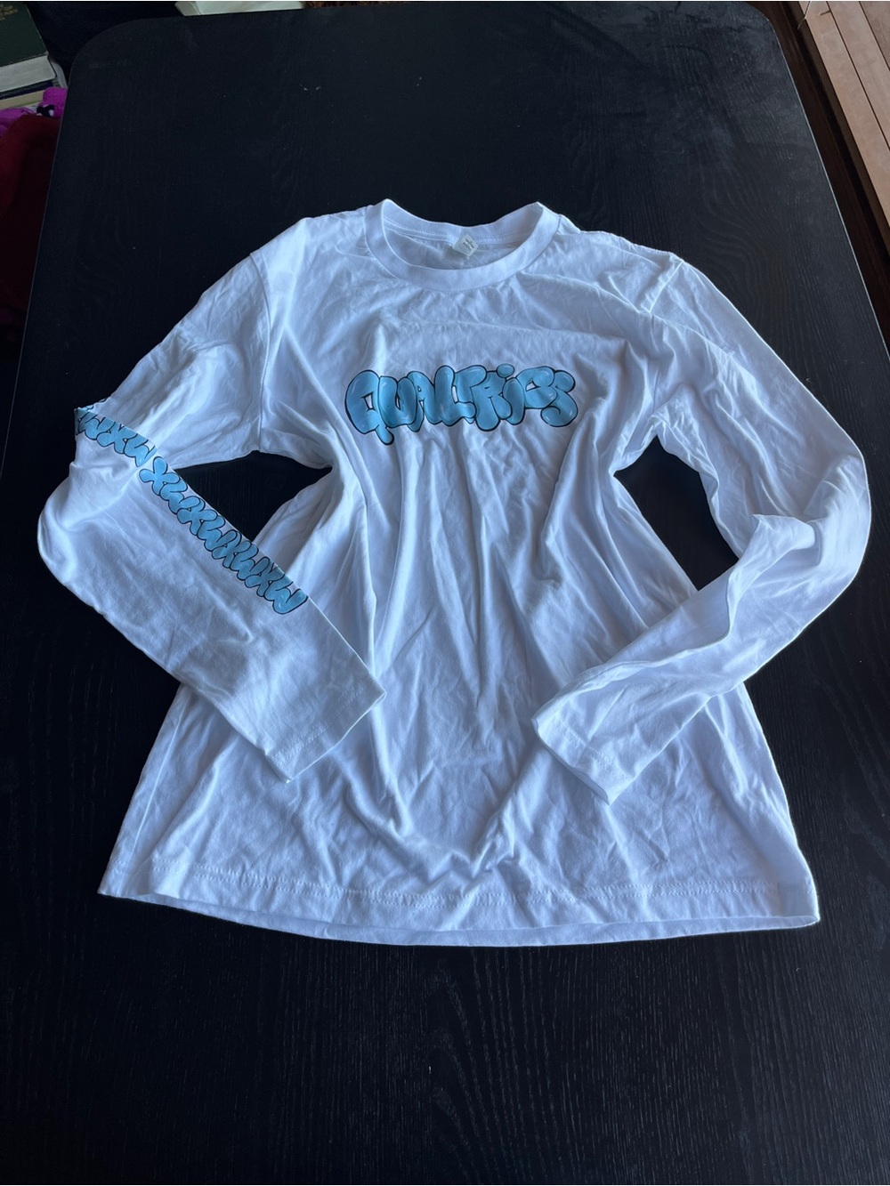 Next Level Apparel White Long-Sleeve Tee with Blue Bubble Script